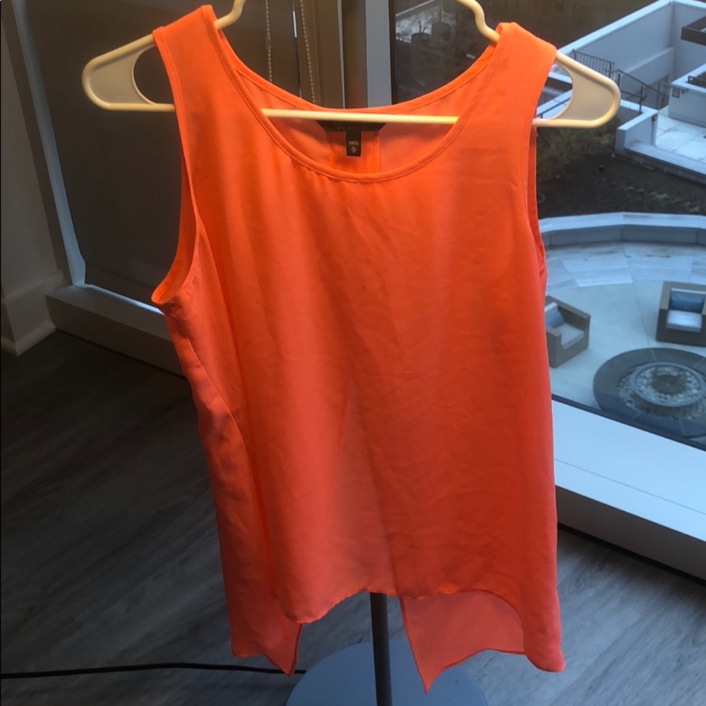 Bright pink sleeveless shirt